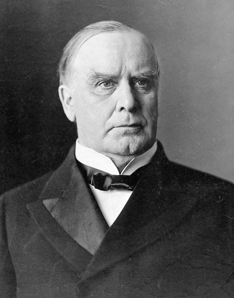 U.S. President William McKinley signs a joint resolution to Congress for declara