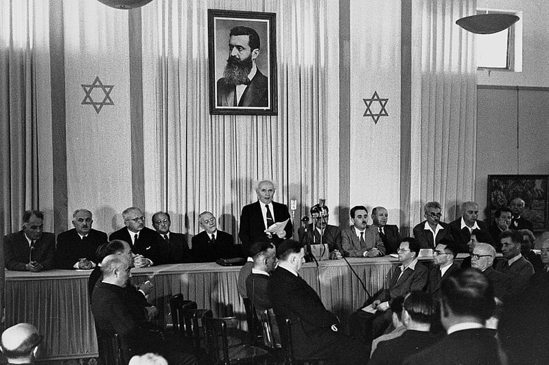 Israel is declared to be an independent state and a provisional government is es