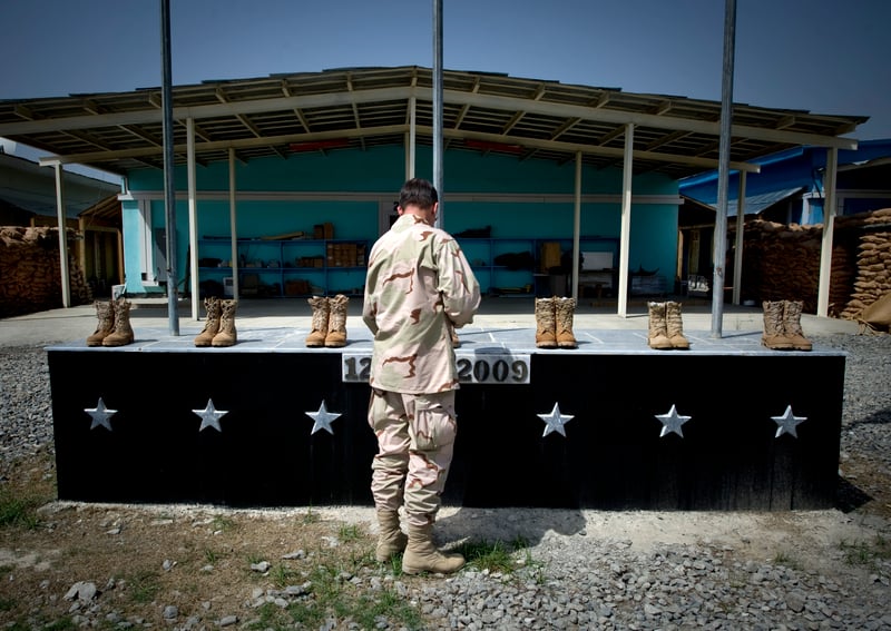 A suicide bomber kills nine people at Forward Operating Base Chapman, a key faci